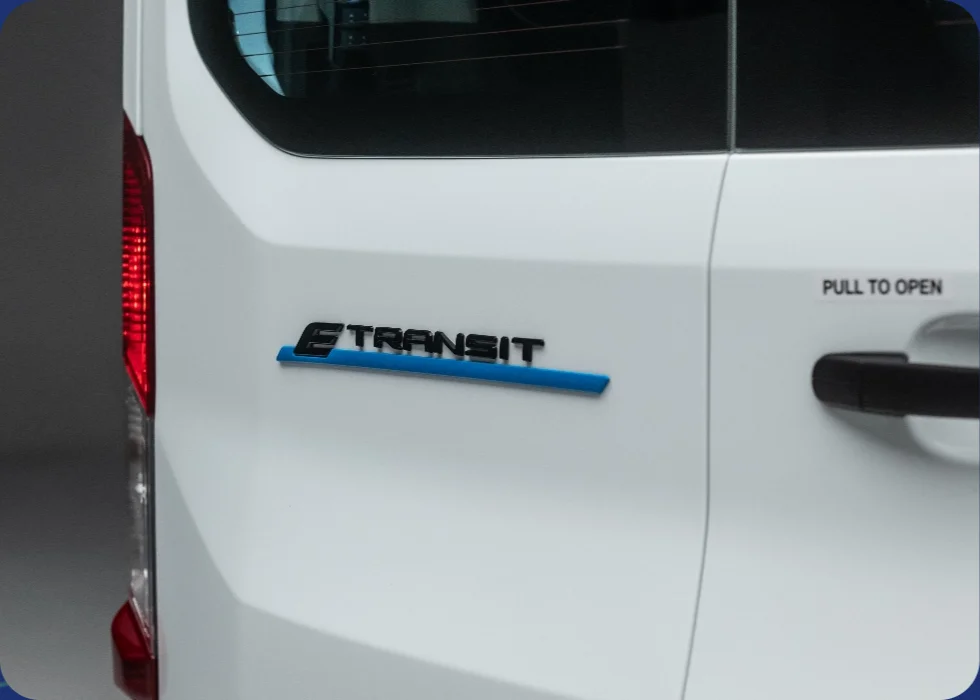 Ford E-Transit badge on the rear of the EV16 electric minibus